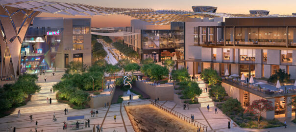 A concept photo of the MiSK Foundation proposed design, showing a town centre with various offices and shops at sunset. Nature is implemented in the design, with trees implemented across the site.