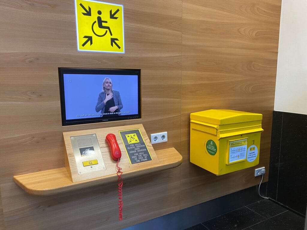 A sign language video displayed on a television.