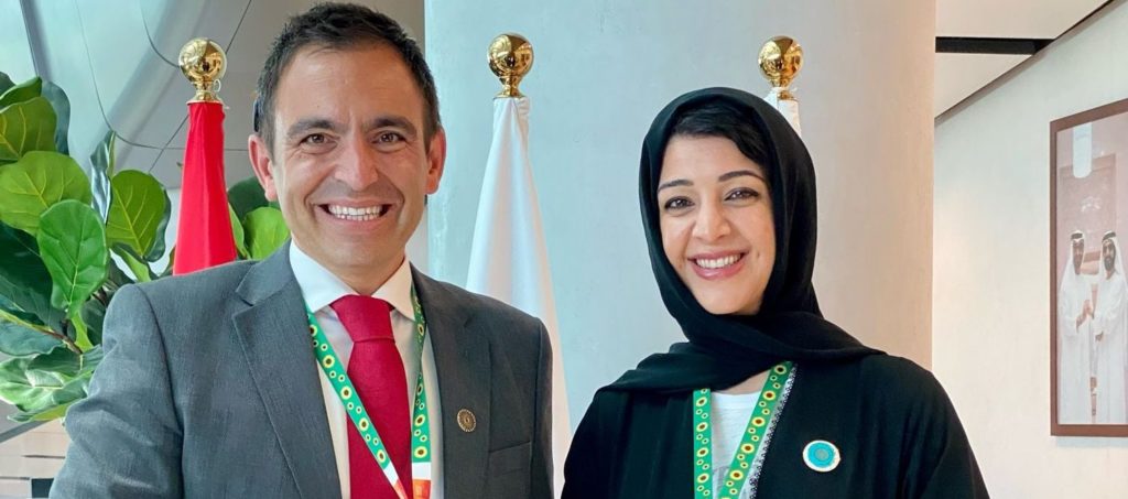 A portrait photo of Steven Mifsud MBE with Her Excellency, Reem Al Hashemy.