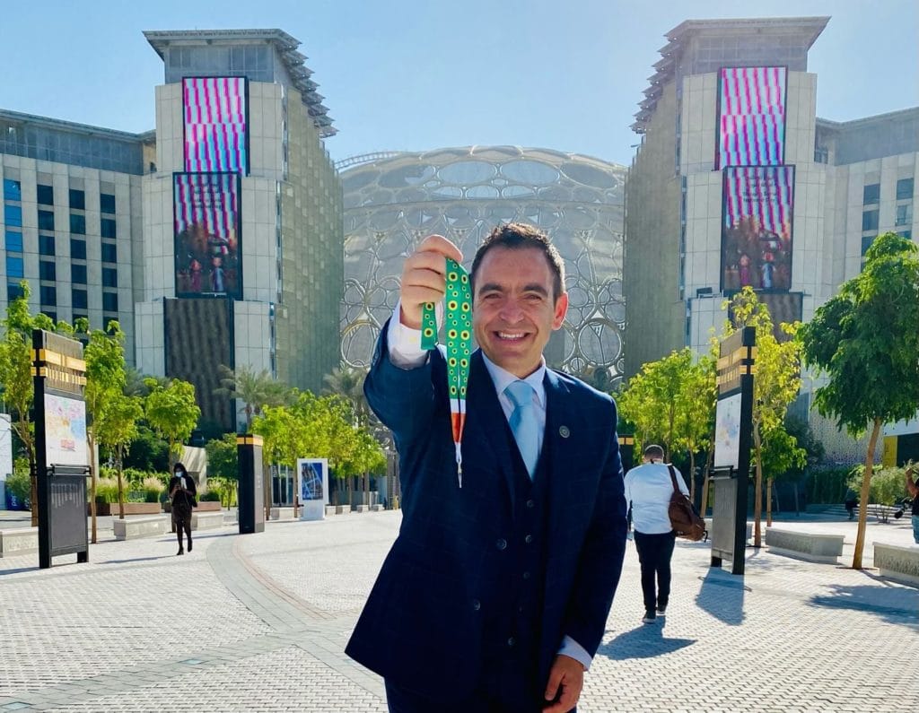 Steven Mifsud MBE holding up a Sunflower Lanyard