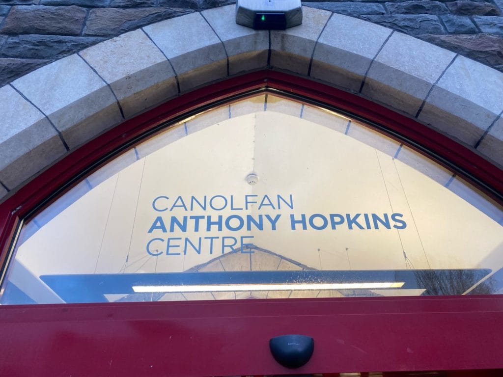 A close up of the logo for the Anthony Hopkins Centre.