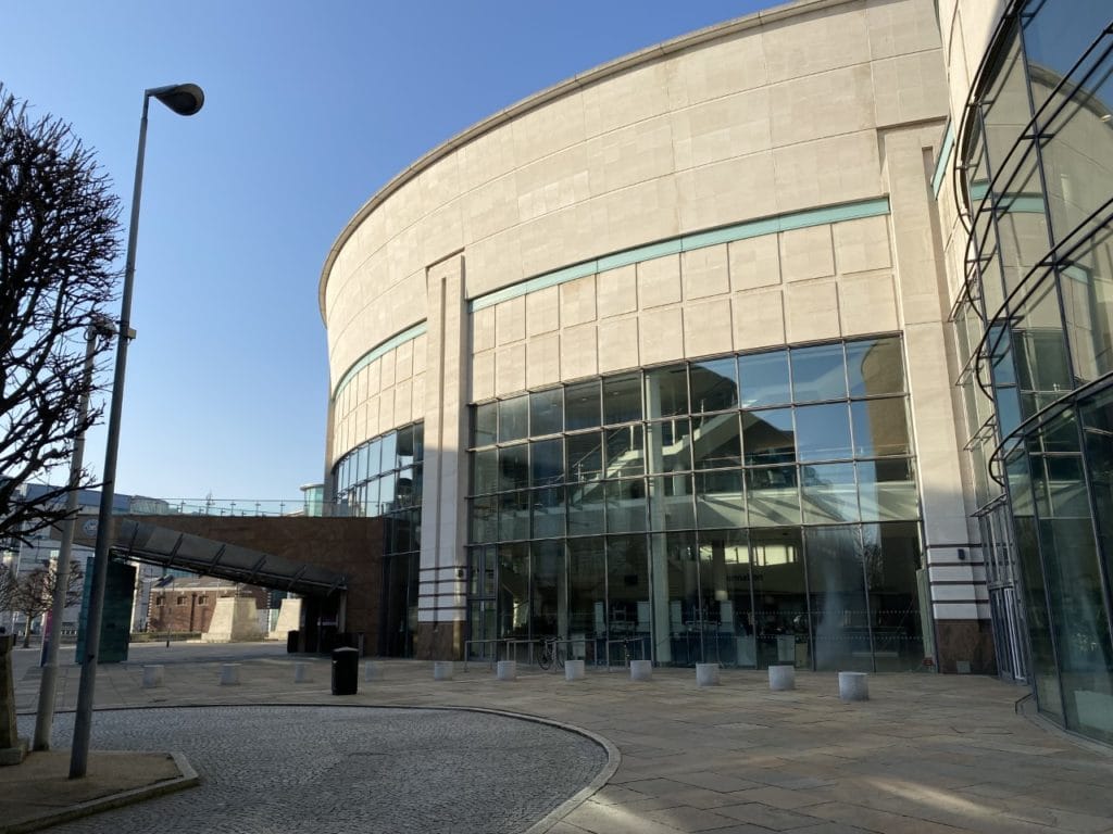 Belfast Waterfront Hall exterior on a clear day