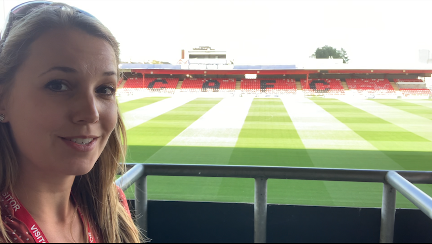 Woman takes a selfie at Crewe Alexandra Stadium