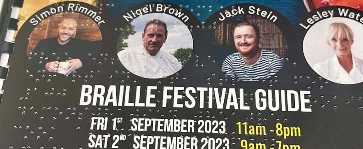 A close up of a Braille festival guide for the Nantwich Food Festival 2023. Photos of various guests are on the cover, including Simon Rimmer, Nigel Brown, Jack Stein and Lesley Waters.