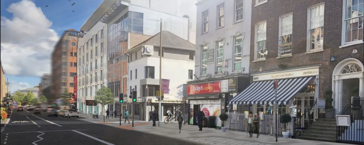 5+C’s+-+Chichester+Street A proof of concept photograph of the proposed new design of Chichester Street in Belfast showing a bustling street front with new modern buildings.