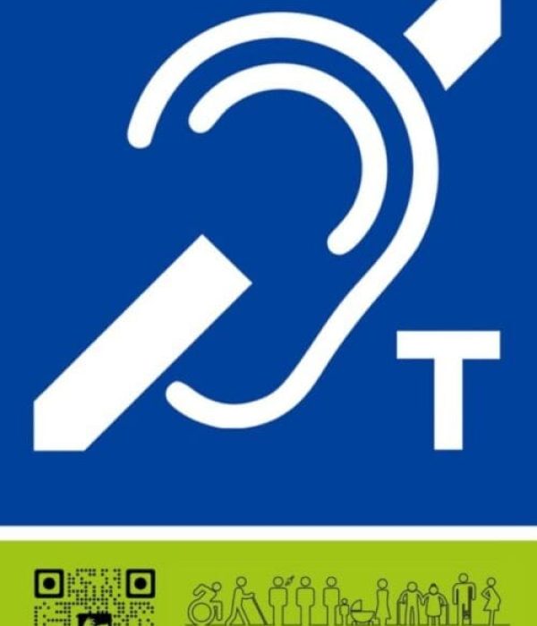 A blue counter induction loop sign with a green footer featuring the Direct Access logo and a QR code link.