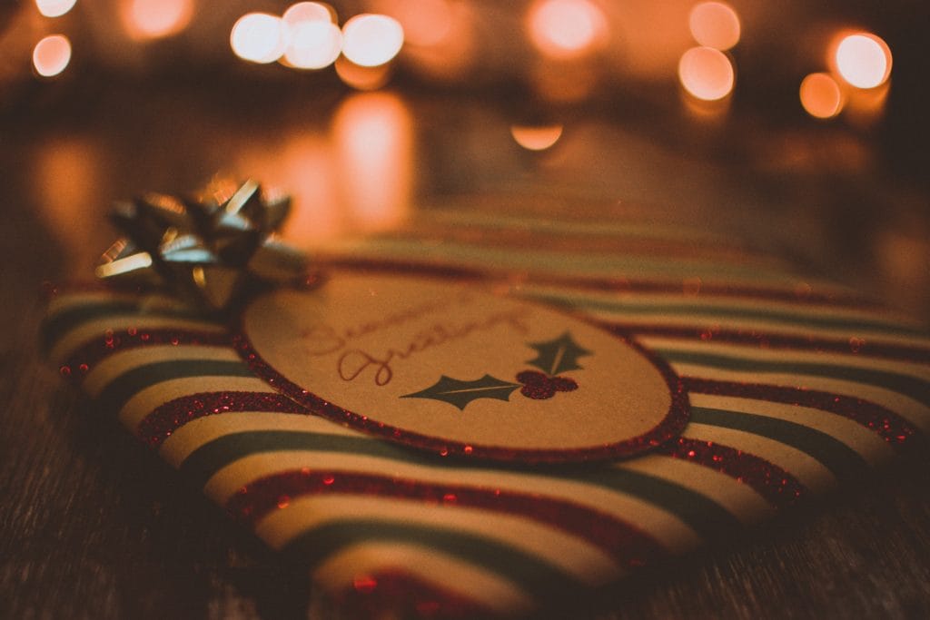 A close up of a wrapped up Christmas gift.